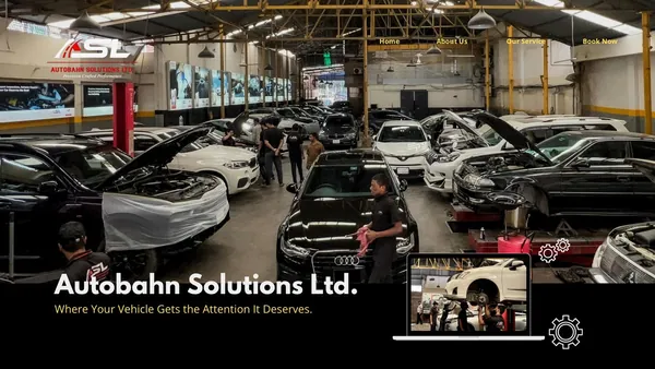 Wide view of the Autobahn Solutions workshop full of European cars, Dhaka