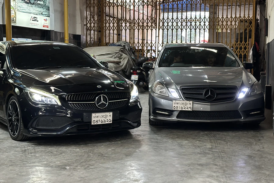Mercedes-Benz models parked at the Autobahn Solutions workshop in Dhaka